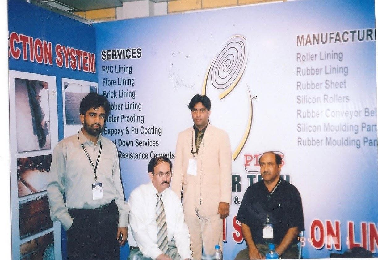 Rubber Tech Plus team at an industrial trade expo